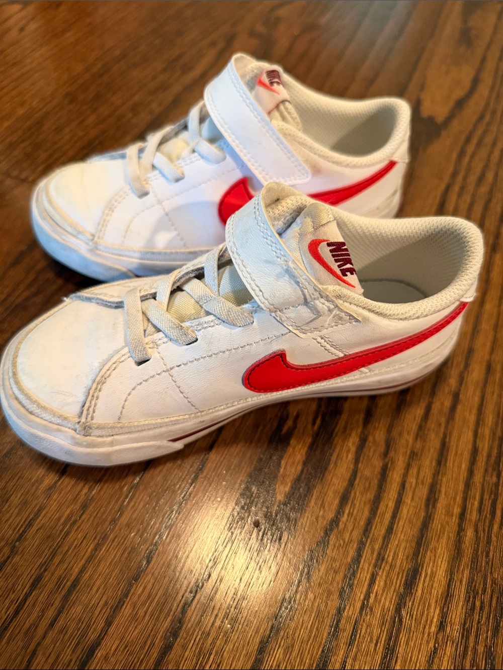 Nike Kids White Sneakers with Red Swoosh and Hook-and-Loop Strap